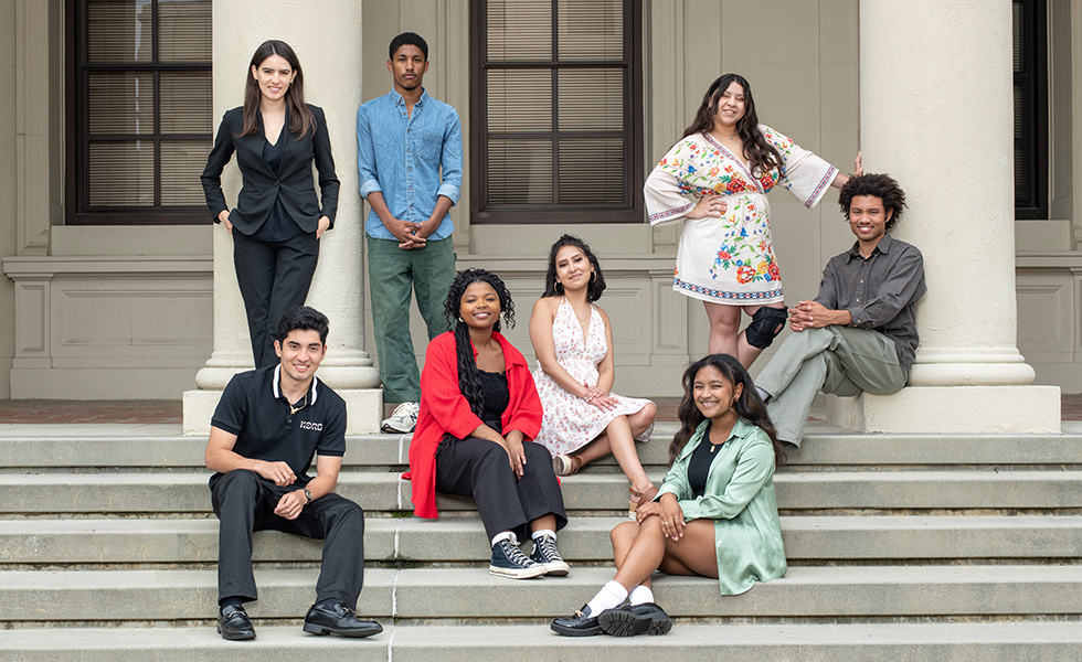 The 2023-24 cohort of Obama Scholars posing on the steps of AGC