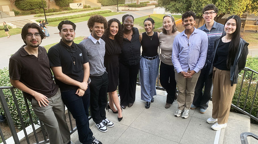 A group of Obama Scholars pose with Judge Lucy after an event
