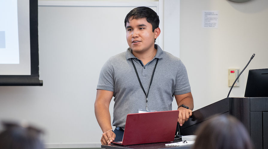 Raymond Arias presenting as co-president of the Law Society