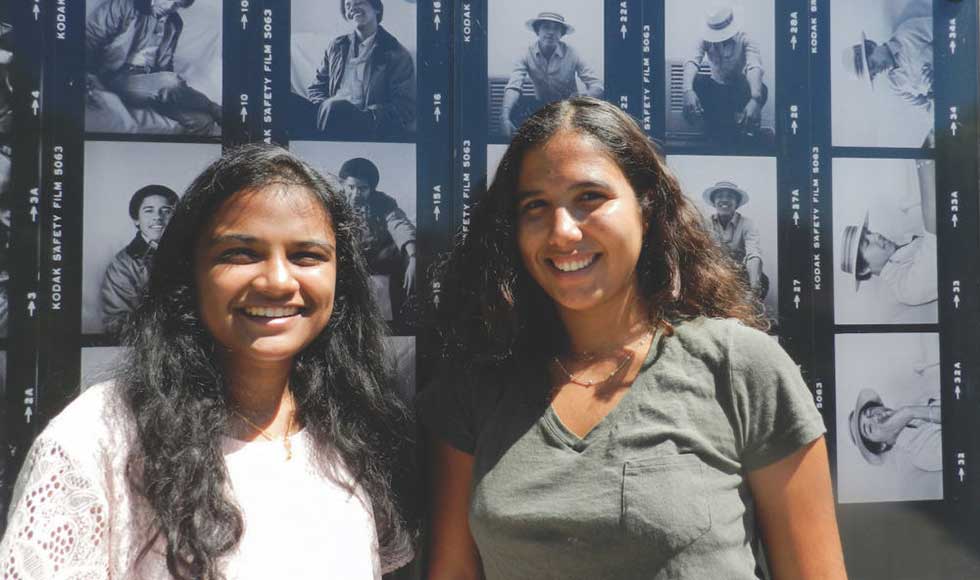 Sherin Aboobucker (first year), left, and Noa Richard (first year), right, outside of Haines Hall at Occidental College in Los Angeles